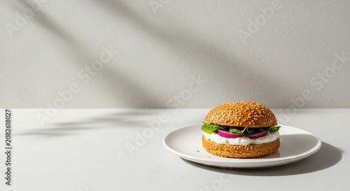 Delicious burger on a white plate.