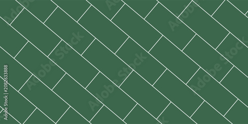 Wide green subway tile wall, with a classic horizontal brick pattern texture