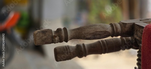 Tableau sur toile Vintage carved wooden furniture details, antique weathered wood spindles, rustic