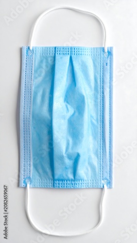 Disposable face covering protection against airborne particles