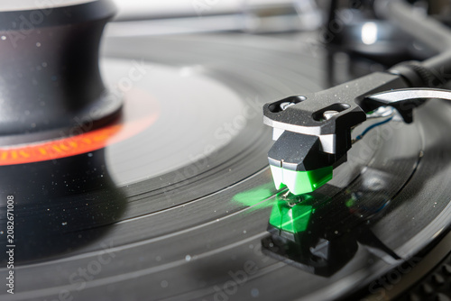 Macro Close-Up of Turntable Stylus Playing a Vinyl Record