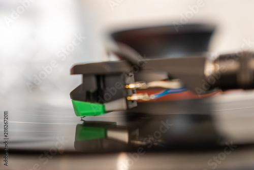 Macro Close-Up of Turntable Stylus Playing a Vinyl Record