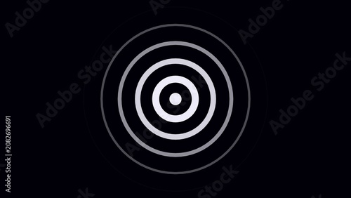 Tableau sur toile Concentric white circles of varying thickness and spacing create a ripple or tar