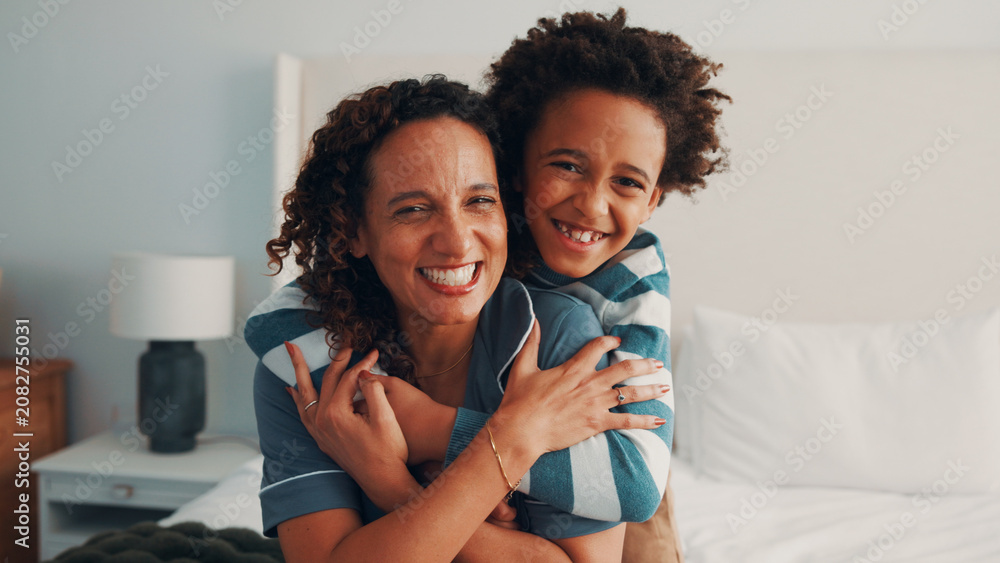 Obraz premium Support, smile or black family on bed with portrait, parent connection or bonding together on day off. Security, mother or child in home with hug, happy relationship or caring moment on weekend break