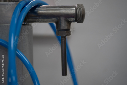 Photos Stainless Steel Pipe Connection on Industrial Processing Equipment