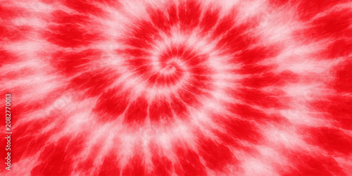 Foto A vibrant tie-dye pattern in shades of red and white swirls in a mesmerizing spiral, creating a retro and groovy aesthetic