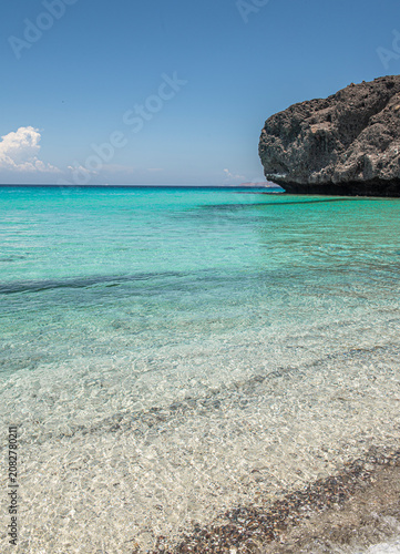 The city of La Paz, capital of the state of Baja California Sur, is a Mexican tourist destination featuring the crystal-clear waters of a white-sand beach during summer vacation, 