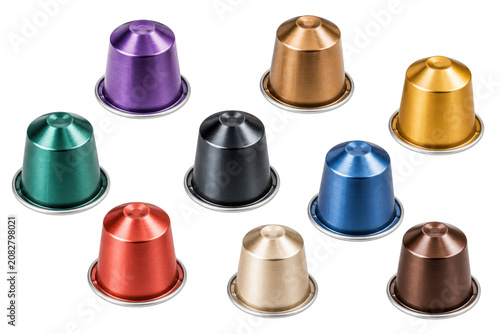Set of colorful metallic coffee capsules, isolated png.