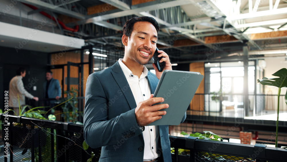 Fototapeta premium Happy, phone call and businessman with tablet in office, wealth management and chatting with contact. Business, financial advisor and person with mobile for communication, online or investment update