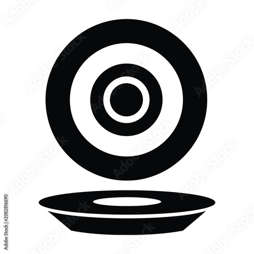 Black and white plate with concentric circles design on top isolated on white background