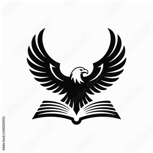 Black eagle on open book.