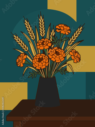 Vibrant orange marigolds and wheat in a black vase on a wooden table with a geometric teal