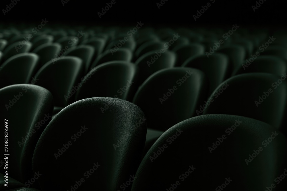 Obraz premium Shadows envelop seats in deep green tones, evoking mystery and quiet tension.