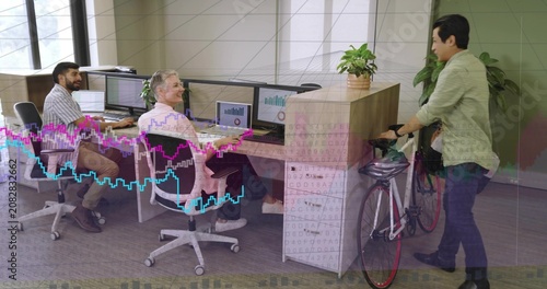 Diverse coworkers greeting colleague pushing road bicycle at office with helmet and bag, copy space