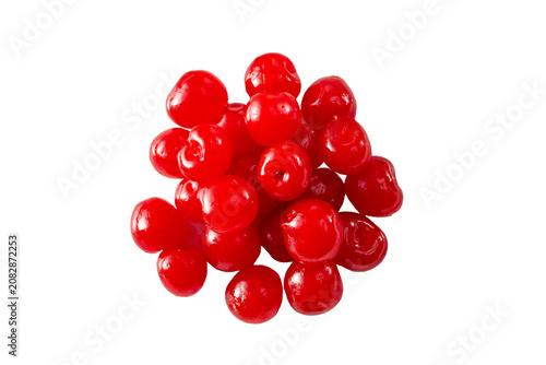 Photos A top down view of a pile of maraschino cherry, against a white background