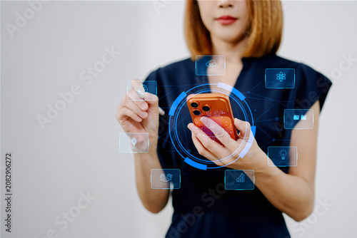 Obraz na plátně Woman using chatbot in computer and tablet  smart intelligence Ai