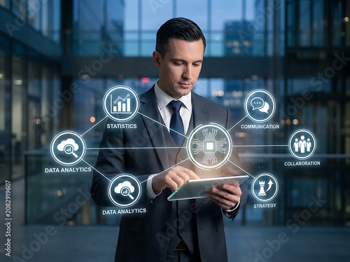Businessman using tablet with digital analytics interface.