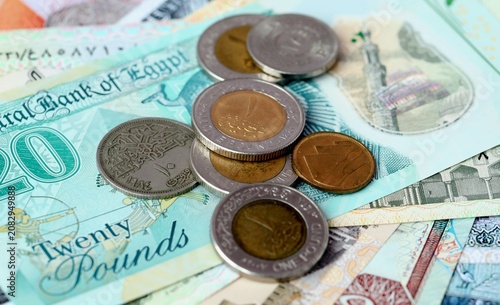 Photography Egyptian pound money bills and coins on table