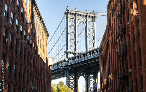 Washington Street in DUMBO, Brooklyn. Iconic Manhattan Bridge view between historic buildings. DUMBO neighborhood in Brooklyn.