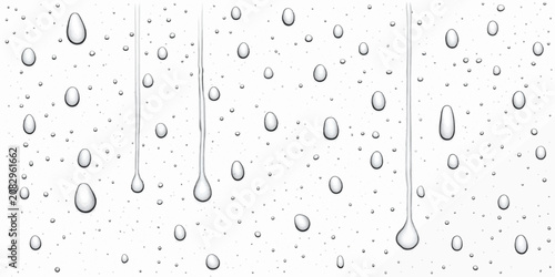 Konstfotografi Clear raindrops trickling down a glass windowpane surface with raindrops transpa
