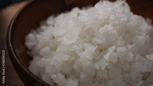 Dolly Shot of Natural Sea Salt in a Wooden Bowl