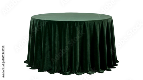 Elegant round table covered with luxurious dark green velvet tablecloth with beautiful draping and folds, perfect for wedding, event, and formal decor.