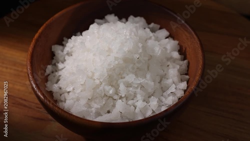 Dolly Shot of Natural Sea Salt in a Wooden Bowl