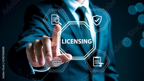 Digital licensing concept with businessman using virtual security interface and technology icons