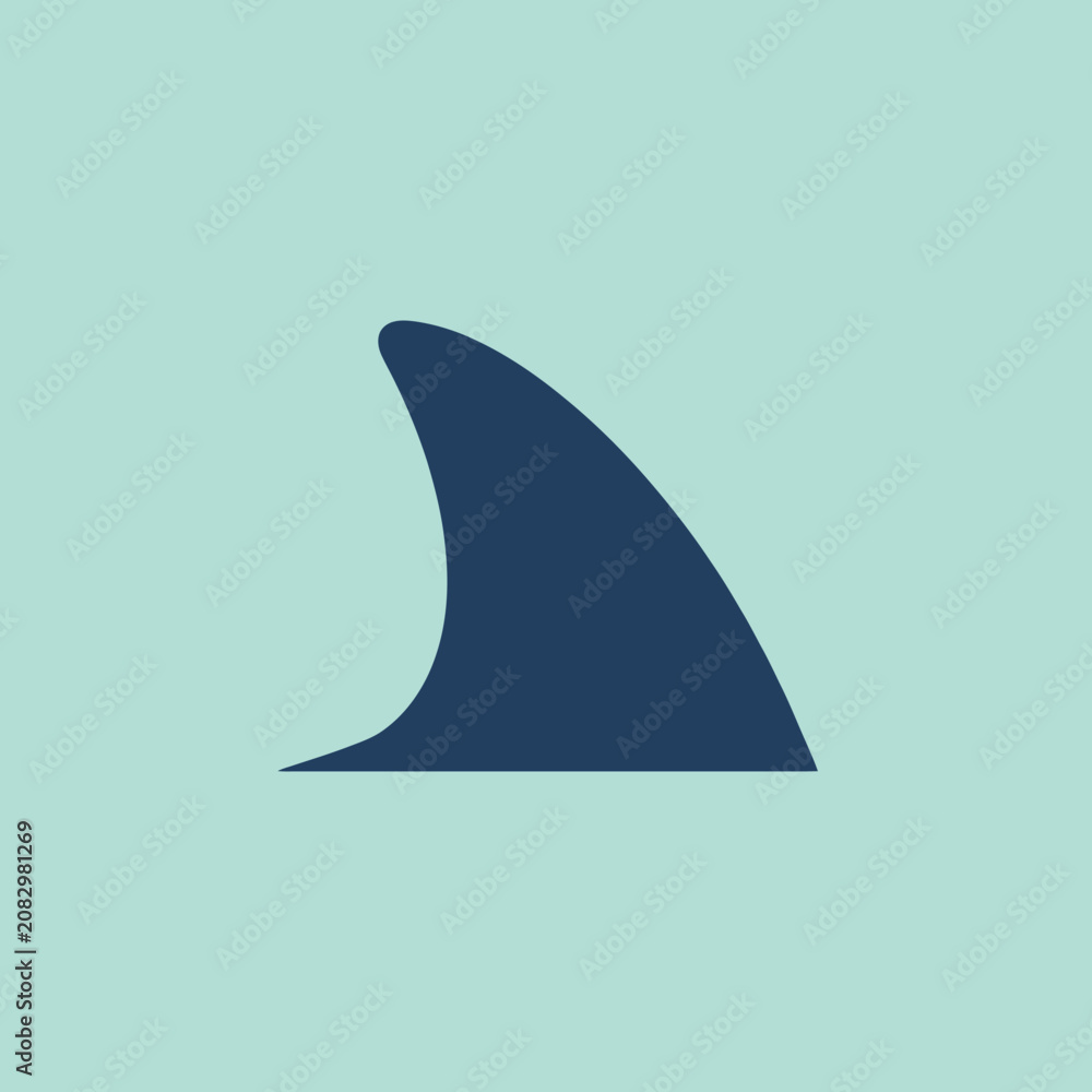 Fototapeta premium A dark blue shark fin silhouette on a light green background
