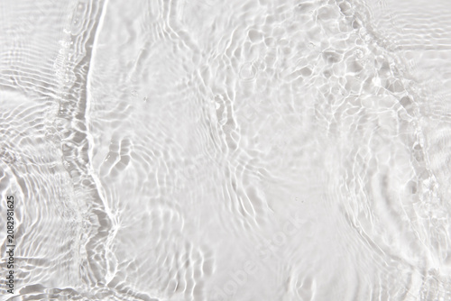 water waves cross each other creating ripples.