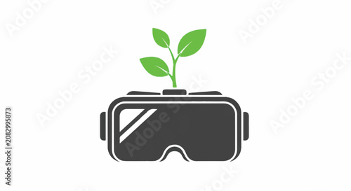 A virtual reality headset with a small green plant growing out of it sits on a surface.