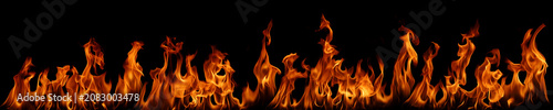 Canvastavla Realistic orange fire flames isolated on black background