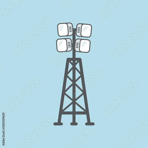A tall stadium floodlight tower stands against a light blue background