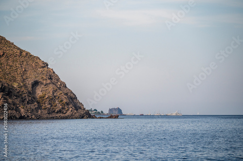 Breathtaking sunset over the Aeolian Islands. The island of Stromboli in all its magnificence between eruptions.