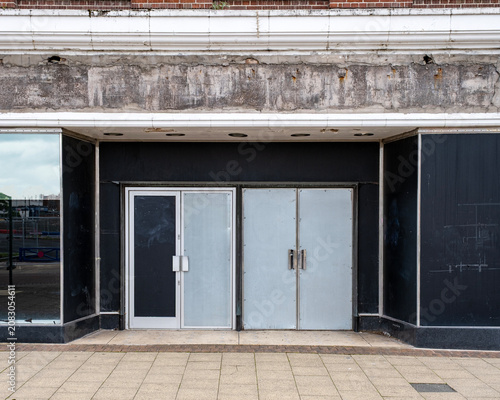 Closed down shop with removed sign
