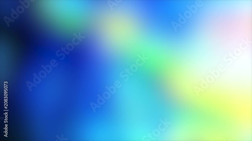 Blurry colorful abstract background with blue, green, and yellow hues