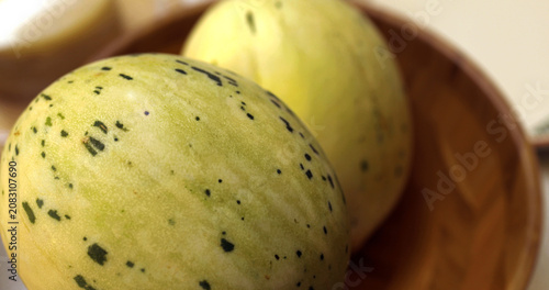 white-skinned melons in a bowl