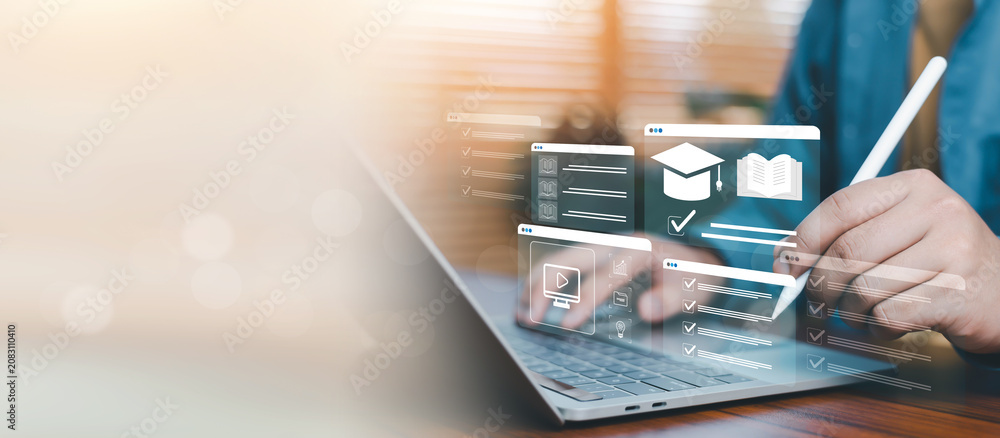 Fototapeta premium Interactive e-learning platform displayed on a laptop and tablet, featuring digital courses, online training, virtual classrooms, knowledge management, educational technology, and professional skill
