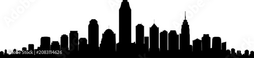 Black silhouette skyline of a dense city with numerous skyscrapers of varying heights and shapes