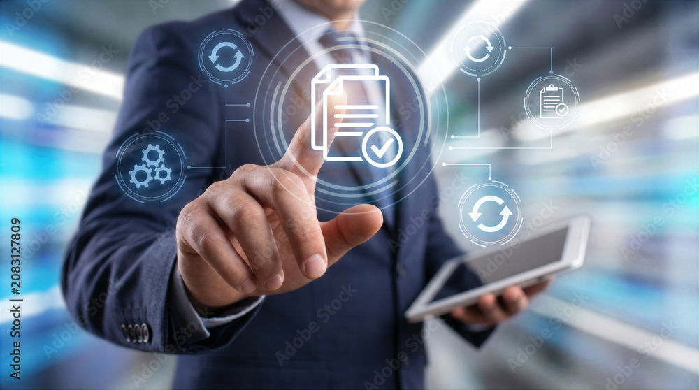 Fototapeta premium Document management system for business data and file storage. Professional touches a virtual interface with approval checkmark while holding a tablet. Digital paperwork automation, workflow process