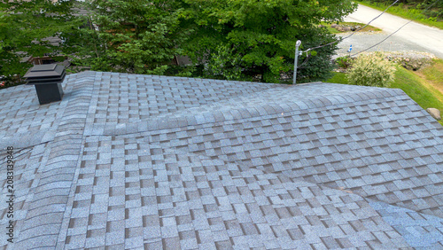Aerial view of a  weathered shingles roof