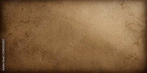 Fotografie Aged and weathered vintage brown paper texture background with antique grunge pa