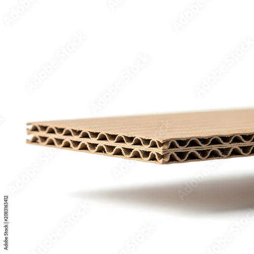 Macro Close-up of Corrugated Cardboard Texture on White Background