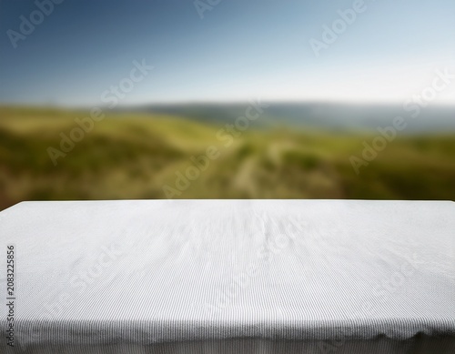empty rectangular table with white tablecloth