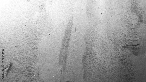 Bilde på lerret Monochrome light cement surface background with soft stains, fine scratches, and raw weathered texture detail