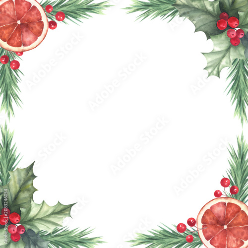Christmas frame with tree branches, holly, red berries and dried red orange slice. Watercolor illustration. Isolated element on a white background. For packaging, greeting cards, seasonal design.