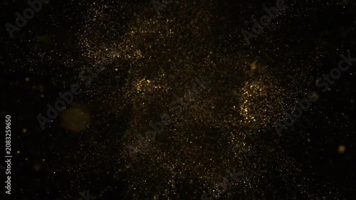 Golden Glittering Particles Exploding and Dispersing on a Black Background, Abstract Cosmic Dust Cloud.