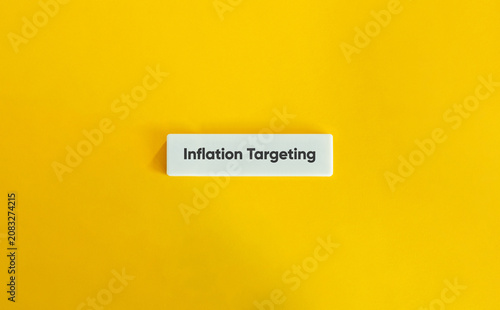 Konstfotografi Inflation targeting concept on yellow background for economic policy