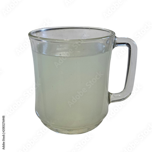 Valokuva A clear glass mug filled with lemonade beverage, stands ready to quench thirst