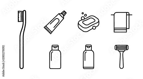 Bathroom essentials including toothbrush, toothpaste, soap, towel, shampoo, conditioner, and razor on countertop